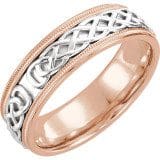 A Celtic Design Band featuring an intricate silver Celtic knot pattern set in a smooth rose gold band.