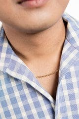 Close-up of a person's lower face, neck, and upper chest, wearing a blue and white checkered shirt with an 18k Solid Yellow Gold Saudi Chain 16"L 2.5g necklace.