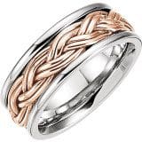 A Comfort Fit Wooven Band with a gold braided design encircling its middle.