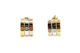 Two sets of 18k Gold Multi-Color 1/2" L Stud Earrings, bundled together and connected by wires, resembling dynamite sticks.
